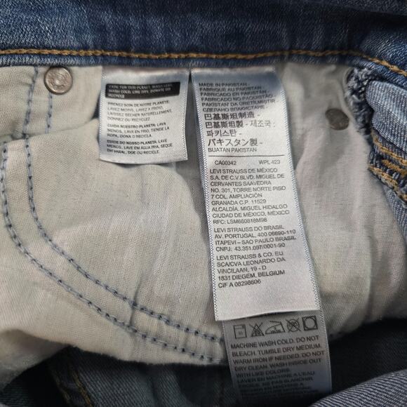 Levi's Jean Shorts Women's 28 Blue Medium Wash Mid Length Cuffed - Picture 5 of 12